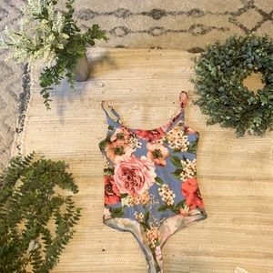 Floral bodysuit never worn size Small